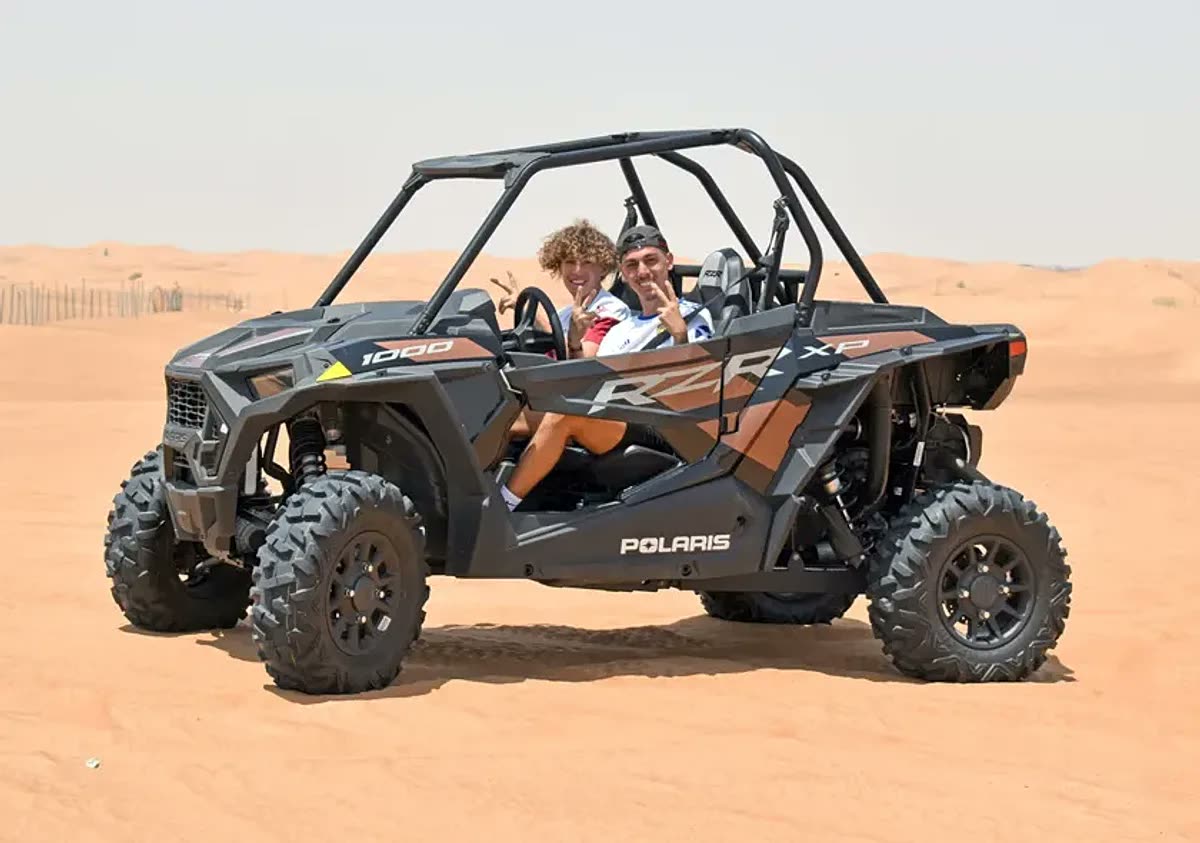 2 Seater Polaris RZR 1000cc dune buggy on red sand