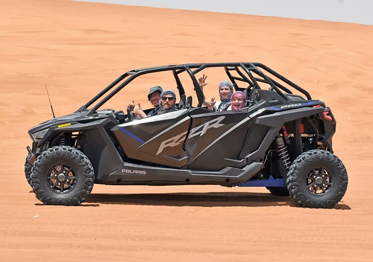 4 Seater Polaris RZR Turbo dune buggy on red sand