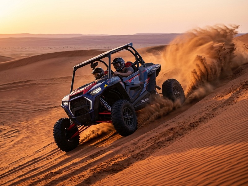 2-seater 1000 CC turbo dune buggy kicking up sand