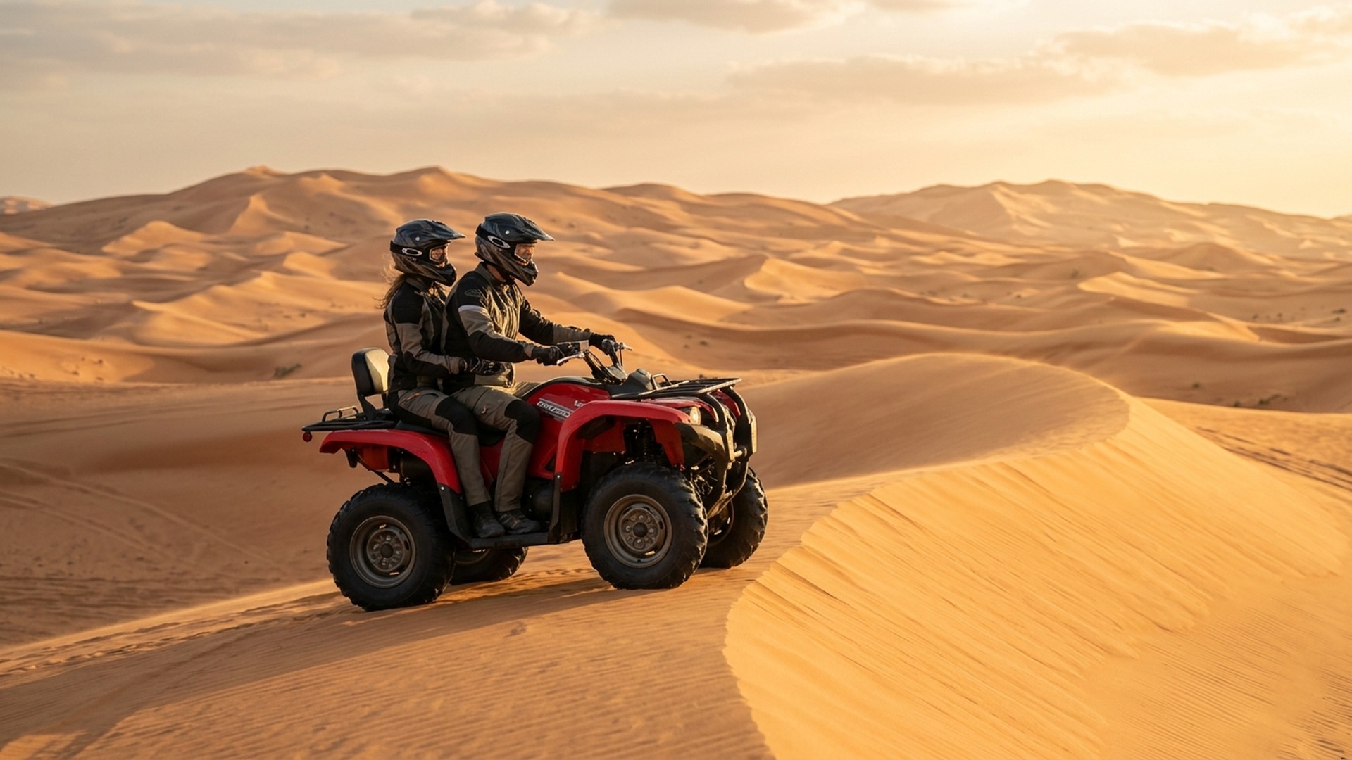 Couple riding two-up on Yamaha quad Lahbab