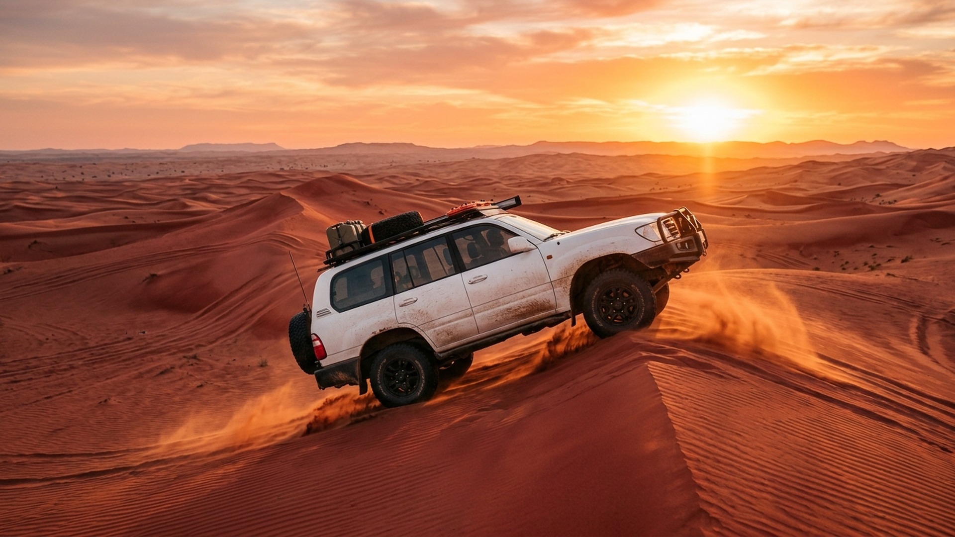 4WD dune bashing at Lahbab sunset