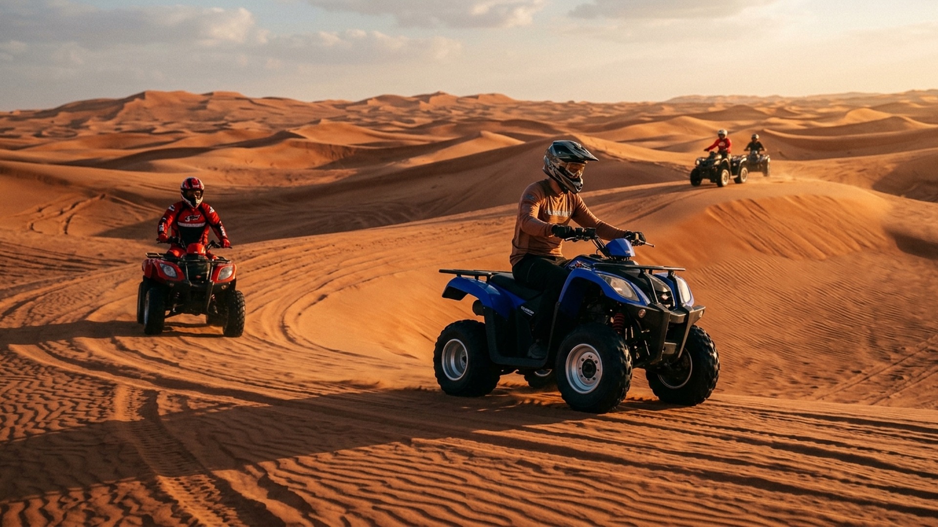 Yamaha quad convoy following a lead guide across open desert