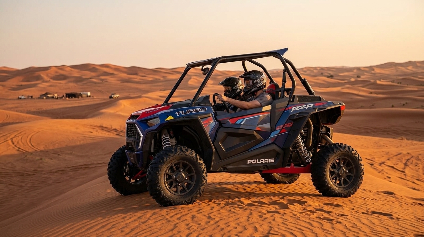 2-seater 1000 CC turbo buggy at golden hour on a dune crest