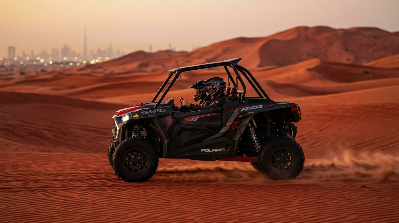 Couple driving a 2-seater 1000 CC turbo buggy across Dubai dunes