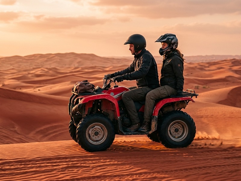 Double seater quad bike with two riders on Lahbab dunes