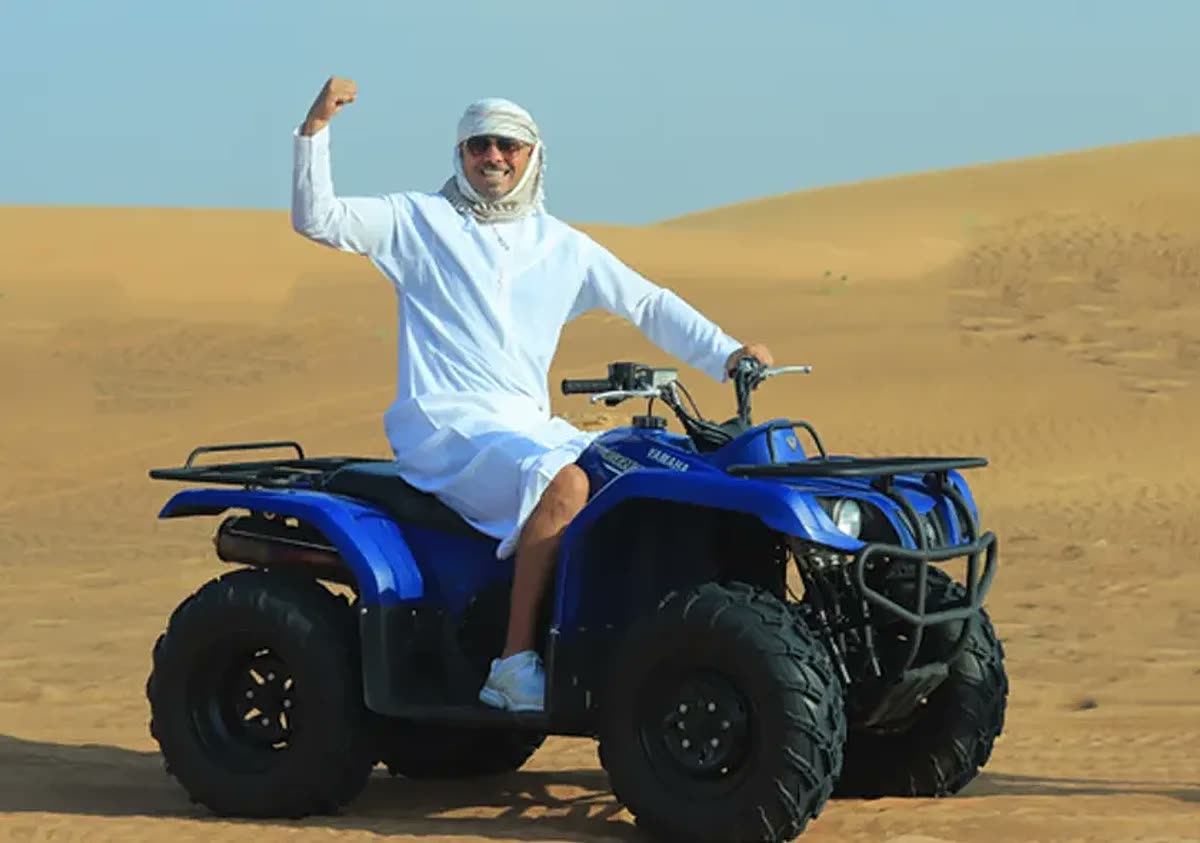 Yamaha Grizzly quad bike on desert trail