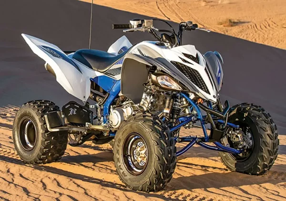 Raptor 700cc quad bike on desert trail
